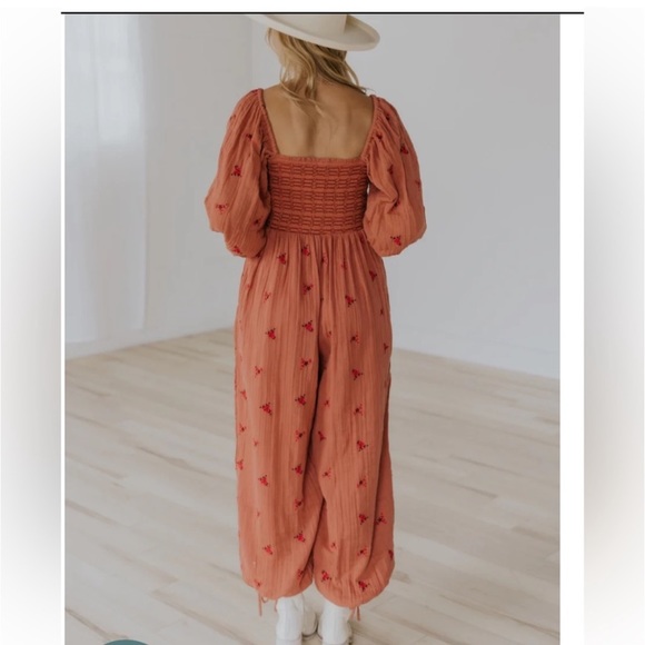 NWT Free People
Dahlia Smocked Jumpsuit - Picture 4 of 11